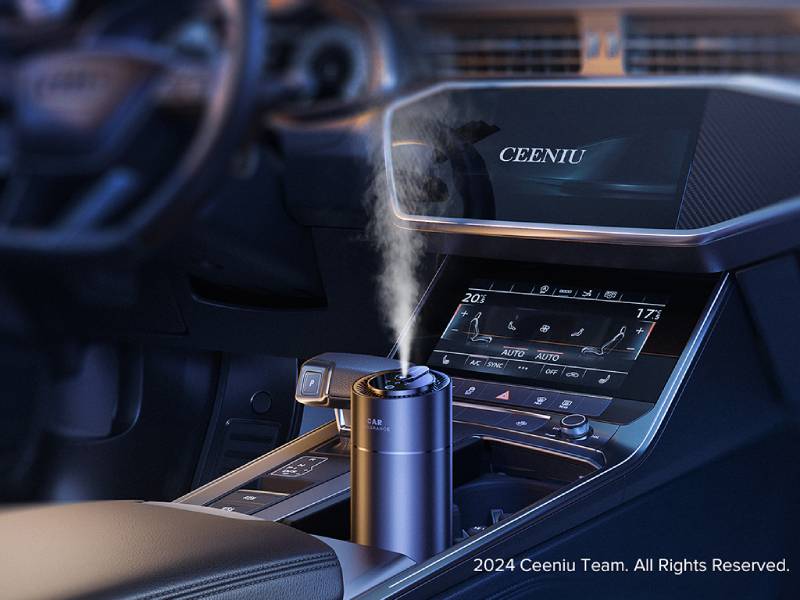 Im Cockpit eines edlen Cabrios sieht man einen eleganten Zylinder, der duftenden Nebel versprüht. Das Bild ist in einem metallic-blauen modernen Look gehalten.